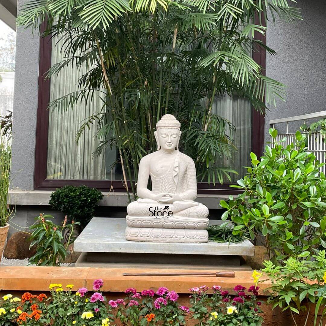 white stone buddha placement
