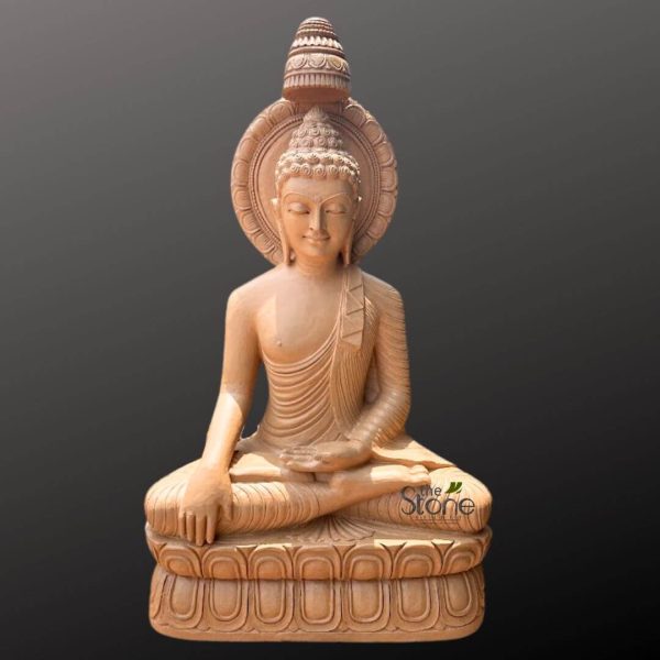 beautifully detailed, light brown stone or carved wood statue of a seated Buddha, radiating tranquility and peace, is centered against a plain, dark gray background. The Buddha is depicted in the full lotus position (Padmasana), with his hands resting gently in his lap in the Dhyana Mudra (meditation gesture), the right hand placed over the left, palms open and facing upwards. His face expresses profound serenity and inner contemplation, with eyes gently closed or downcast and a faint, compassionate smile gracing his lips. His head features the Usnisha, a prominent cranial bump symbolizing wisdom, covered in tightly curled hair, and his elongated earlobes are indicative of his princely past. Behind his head is an intricately carved circular prabhamandala (halo), adorned with a repeating floral or stylized leaf pattern, symbolizing enlightenment. Above this halo, an elaborate, multi-tiered finial or crown-like structure rises majestically, adding to the statue's grandeur. The Buddha wears simple, flowing monastic robes (sanghati), meticulously sculpted with numerous delicate folds and pleats that drape gracefully over his left shoulder, leaving his right arm and chest partially uncovered. He sits upon a magnificent double-tiered lotus pedestal (vishvapadma), each lotus petal distinctly rendered with deep carving, showcasing exceptional craftsmanship. The overall impression is one of spiritual calm, mindfulness, and artistic devotion, making this sculpture an ideal representation for articles discussing Buddhist philosophy, meditation practices, sacred art, or objects of spiritual decor.