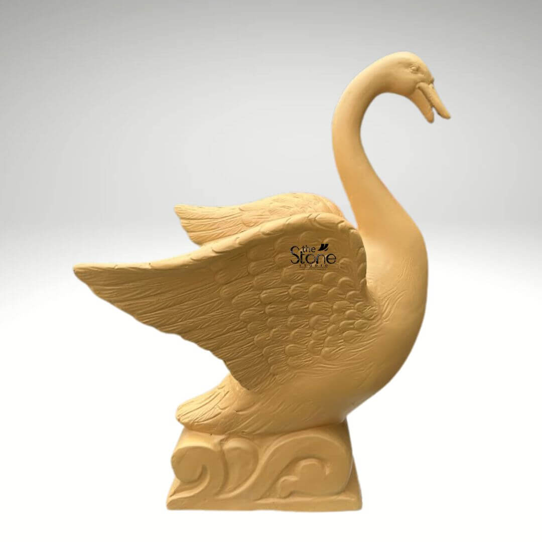Garden Duck Fountain 2ft 8 An elegant 2-foot tall fibre duck water fountain designed for sophisticated garden and landscape decor. Expertly crafted from durable, lightweight fibre material, this sculpture depicts a majestic swan-style duck in a dynamic, poised posture. The fountain features an elongated, arched neck and wide-spread wings that showcase intricate, rhythmic feather textures etched into the surface. The bird is mounted on an artistic pedestal base embellished with traditional wave-like relief carvings, emphasizing its aquatic theme and connection to outdoor water features. Its earthy tan hue and rustic matte finish provide a natural stone aesthetic while remaining weather-resistant and easy to maintain. This artistic centerpiece is ideal for creating a tranquil atmosphere in outdoor courtyards, pond areas, or lush backyards, blending modern craftsmanship with timeless organic forms to enhance a home’s exterior sanctuary.