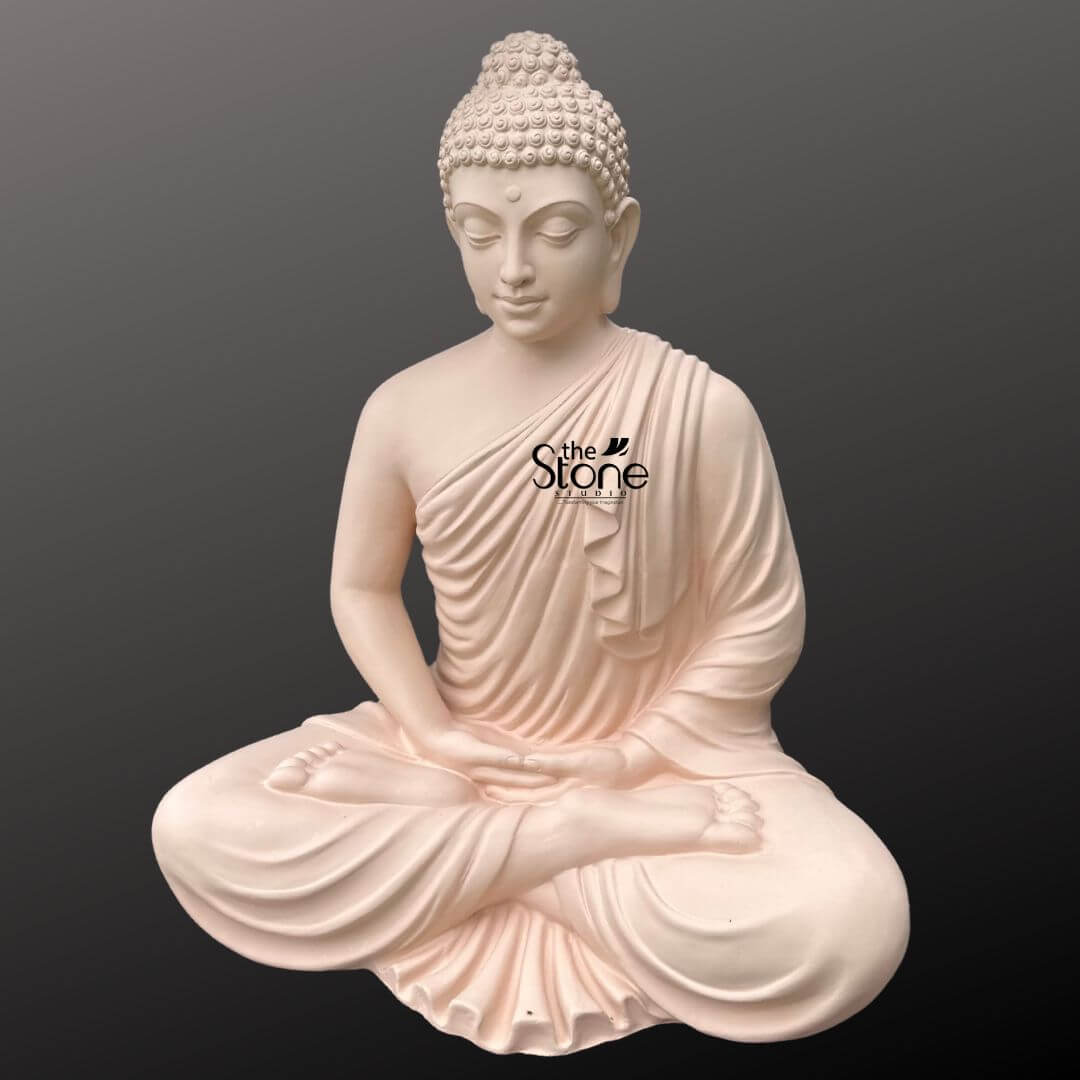 Buddha Statue for Home Decor 4 Feet 5 A serene and majestic 4-foot tall Lord Buddha fibre statue perfectly designed as a spiritual centerpiece for a modern living room or home sanctuary. This life-sized sculpture is masterfully crafted from durable yet lightweight fibre material featuring a smooth pale peach-toned finish that mimics the look of natural stone. Lord Buddha is depicted in a peaceful meditative posture seated in the traditional lotus position with his hands resting calmly in his lap in the Dhyana Mudra symbolizing absolute balance and inner peace. The sculpture showcases fine artisan details including the realistic fluid folds of the monastic robe draped over his shoulder, elongated earlobes symbolizing wisdom, and a peaceful facial expression with closed eyes in deep contemplation. This large-scale Buddha idol creates a tranquil Zen atmosphere inviting an aura of mindfulness peace, and sophisticated elegance into any residential interior or home mandir.