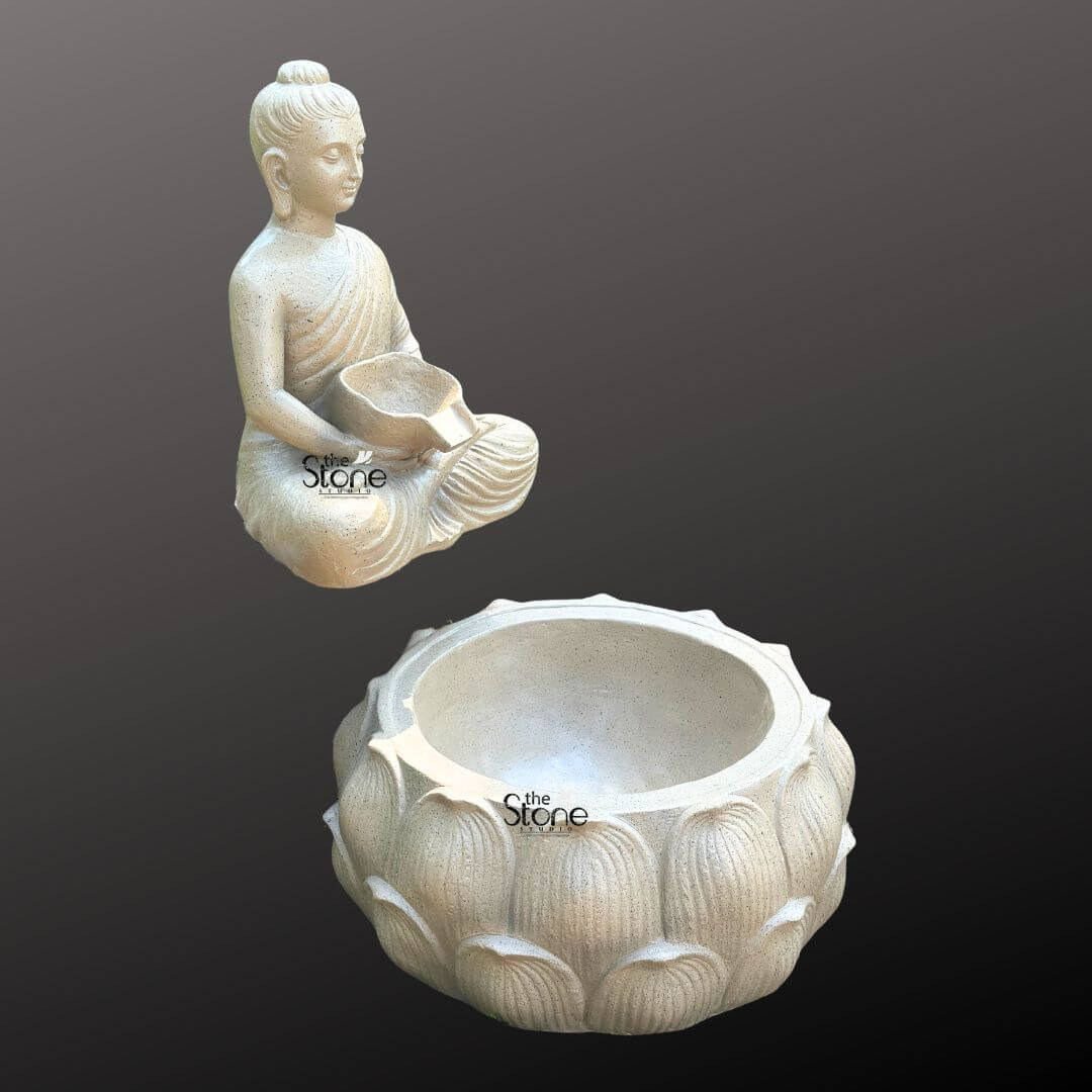 Wall-Mounted Buddha Fountain 3ft 5 A serene wall-hanging Buddha fountain crafted from fiber with a light textured finish is elegantly presented against a dark minimalist background emphasizing its peaceful aesthetic and modular design. The fountain system consists of two distinct components a tranquil Buddha figure and a separate lotus-shaped basin both designed to be mounted on a wall to create a continuous water flow. The Buddha figure sculpted from light-colored fiber to resemble weathered stone, is seated in the lotus position. His hands are gently positioned in his lap holding a small shallow bowl that is designed to channel water serving as the upper source of the fountain. The Buddha's eyes are softly downcast conveying a profound state of inner calm and spiritual contemplation making it an ideal focal point for a meditative environment. The Buddha statue is depicted with smooth flowing robes draped gracefully over his body with visible naturalistic folds that add depth and realism to the lightweight fiber material. His facial features are finely rendered and serene featuring a prominent ushnisha on his head symbolizing wisdom and enlightenment and elongated earlobes indicative of his renunciation of worldly possessions. The light neutral color of the fiber speckled with subtle darker flecks mimics the appearance of natural stone lending the statue a timeless and versatile appeal suitable for various decor styles. Positioned directly beneath the Buddha figure and designed to align for water collection is a large intricately carved lotus-shaped basin. This basin, matching the light-colored textured finish of the Buddha features multiple layers of detailed lotus petals symbolizing purity spiritual awakening, and beauty. The design clearly indicates that water would gently cascade from the Buddha's bowl into this larger aesthetically pleasing basin, creating a soothing sound and visual effect ideal for an indoor or outdoor serene space. This two-piece fiber Buddha fountain is an ideal choice for creating a calming and meditative atmosphere as highlighted in an article discussing wall-hanging Buddha fountains.